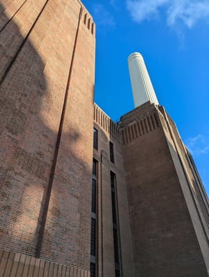 battersea power station on a sunny day with blue sky
