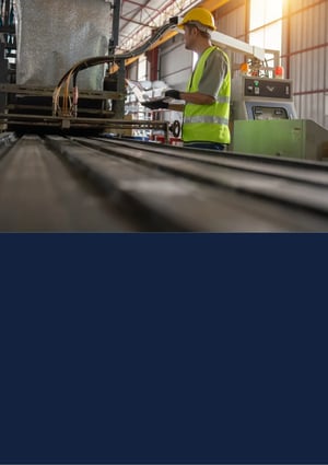 A modern Wilby Jones manufacturing booklet cover featuring an image of man in high vis on a dark blue background.